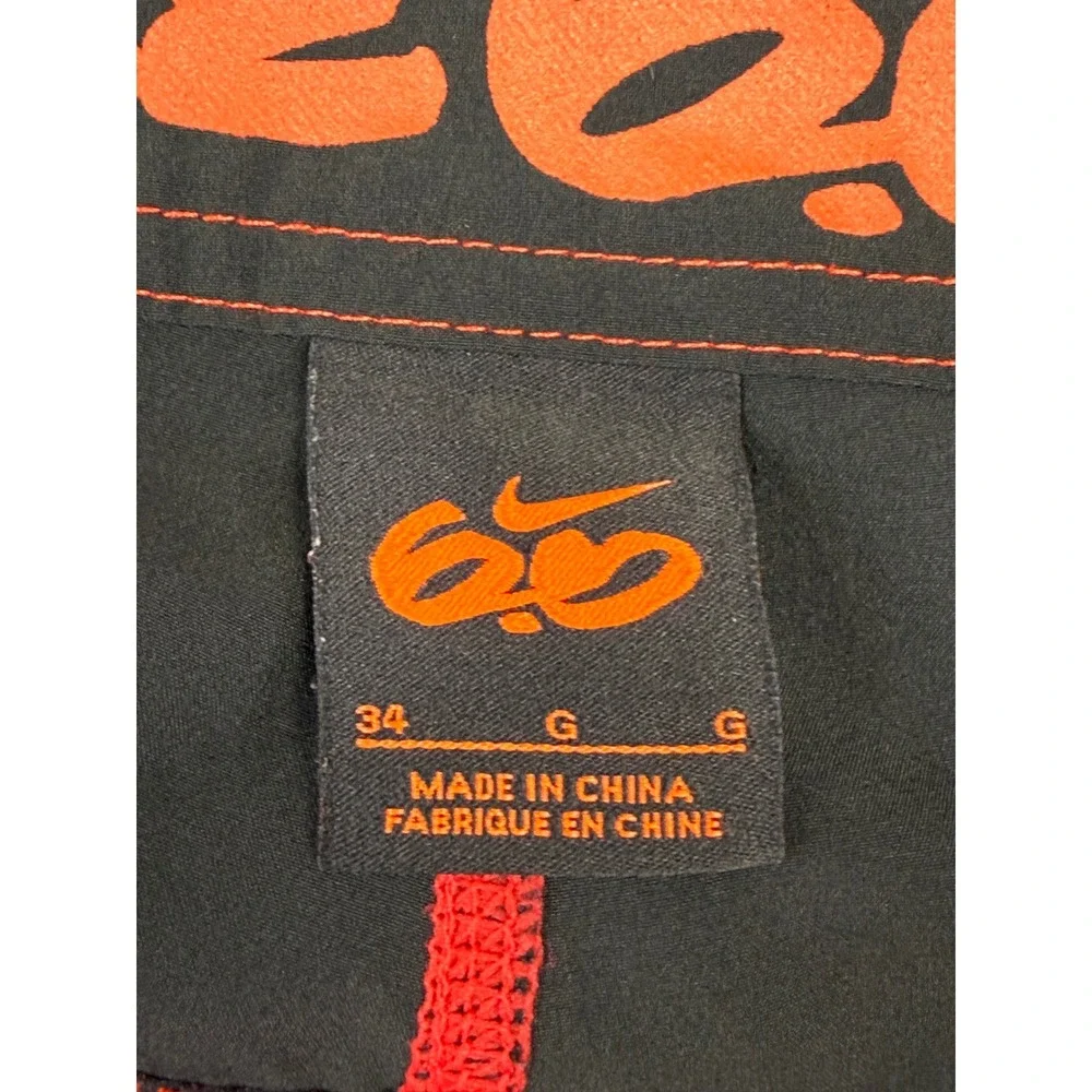 Distressed Nike 6.0 Mens Orange Black Colorblock Board Shorts Size 34 Cargo